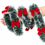 Snow-Tipped Christmas Garland with Red Ribbon Bows